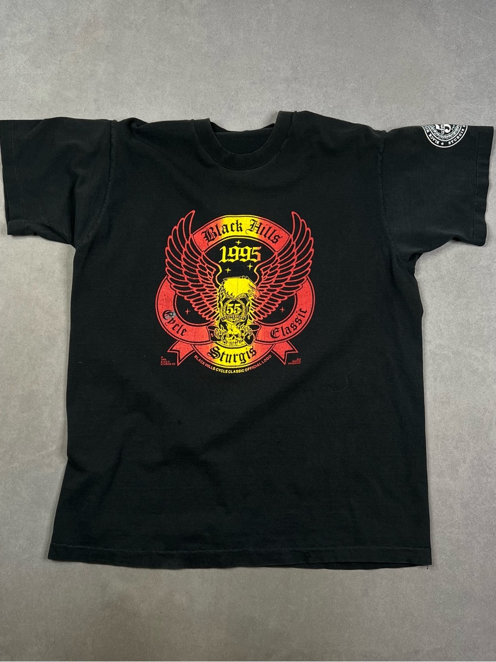 Vintage Black Sturgis 1995 Graphic Tee with Red & Yellow Print